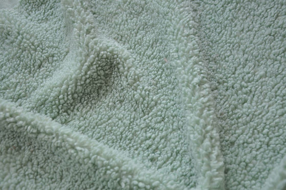 El material de materia textil cómodo y fino para el calor y la moda deforma la tela hecha punto