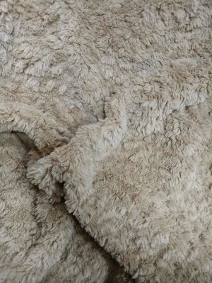Tejido de punto de flor de corte de camello 610 gramos