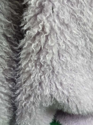 Tejido de peluche rizado de punto de curva es suave y cómodo, 100% poliéster